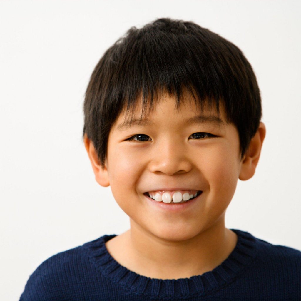 Portrait Of Young Asian Boy Smiling Marc Prensky RE FRAMING   07 Kid Asian Alamy XDKY6P 1024x1024 